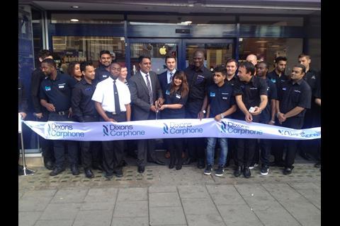 Staff prepare for the ribbon cutting at the Dixons Carphone store on Oxford Street